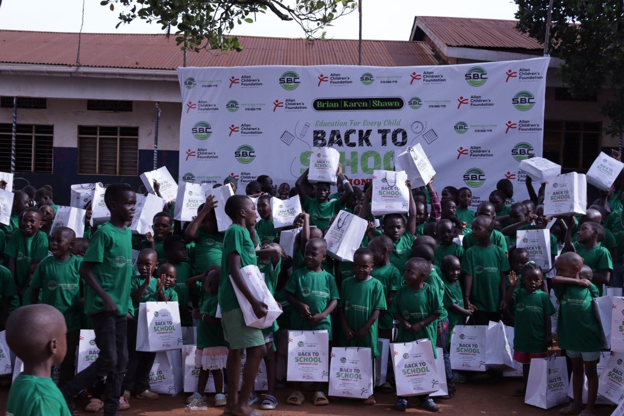 Children showing their new school materials